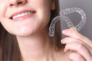 Girl with clear aligners